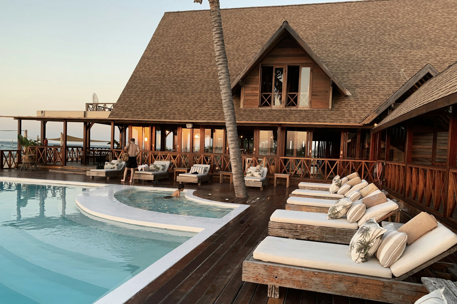 Luxury hotel pool with view of the Rwandan hills